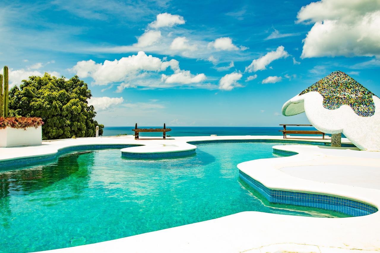 Two Brothers Surf Resort Tola Esterno foto